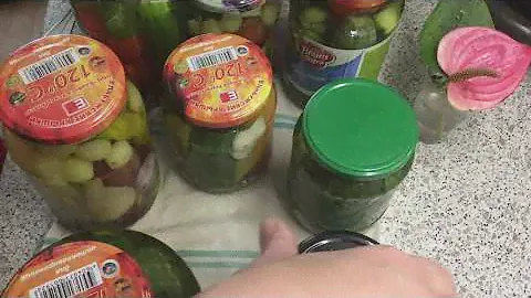 Ассорти из маринованных огурцов и помидоров и так же баночка из ассорти на Новогодний стол 2021!